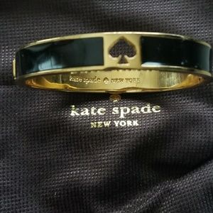 Kate Spade New York hinged bangle bracelet.